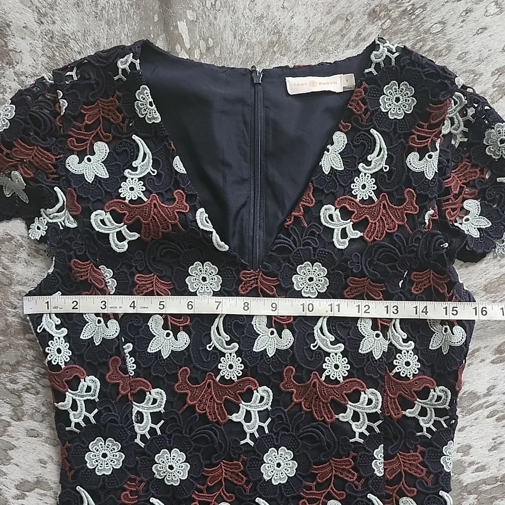Tory Burch zips back